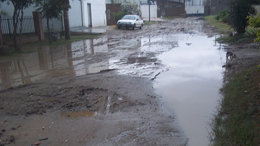 barrio industrial calles destruidas lluvia barro (2)