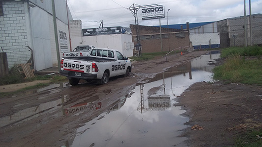 barrio industrial calles destruidas lluvia barro (5)